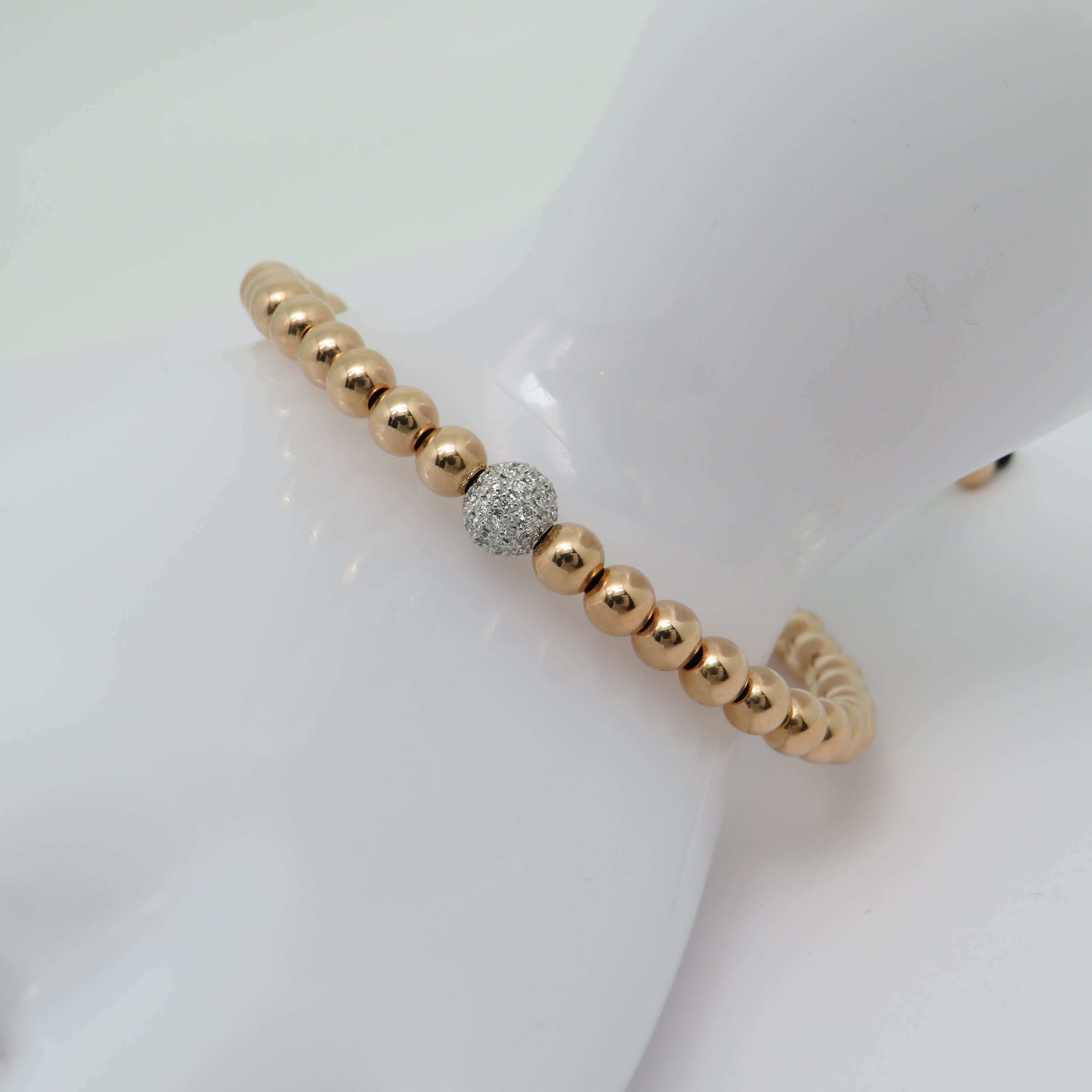 Jaibor pull bracelet with 0.42ct G-si diamond in 750/18K rose gold / nylon