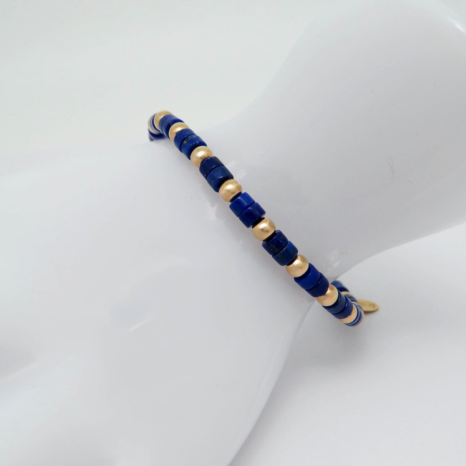 Jaibor pull bracelet with lapis lazuli trimming in 750/18K rose gold / nylon