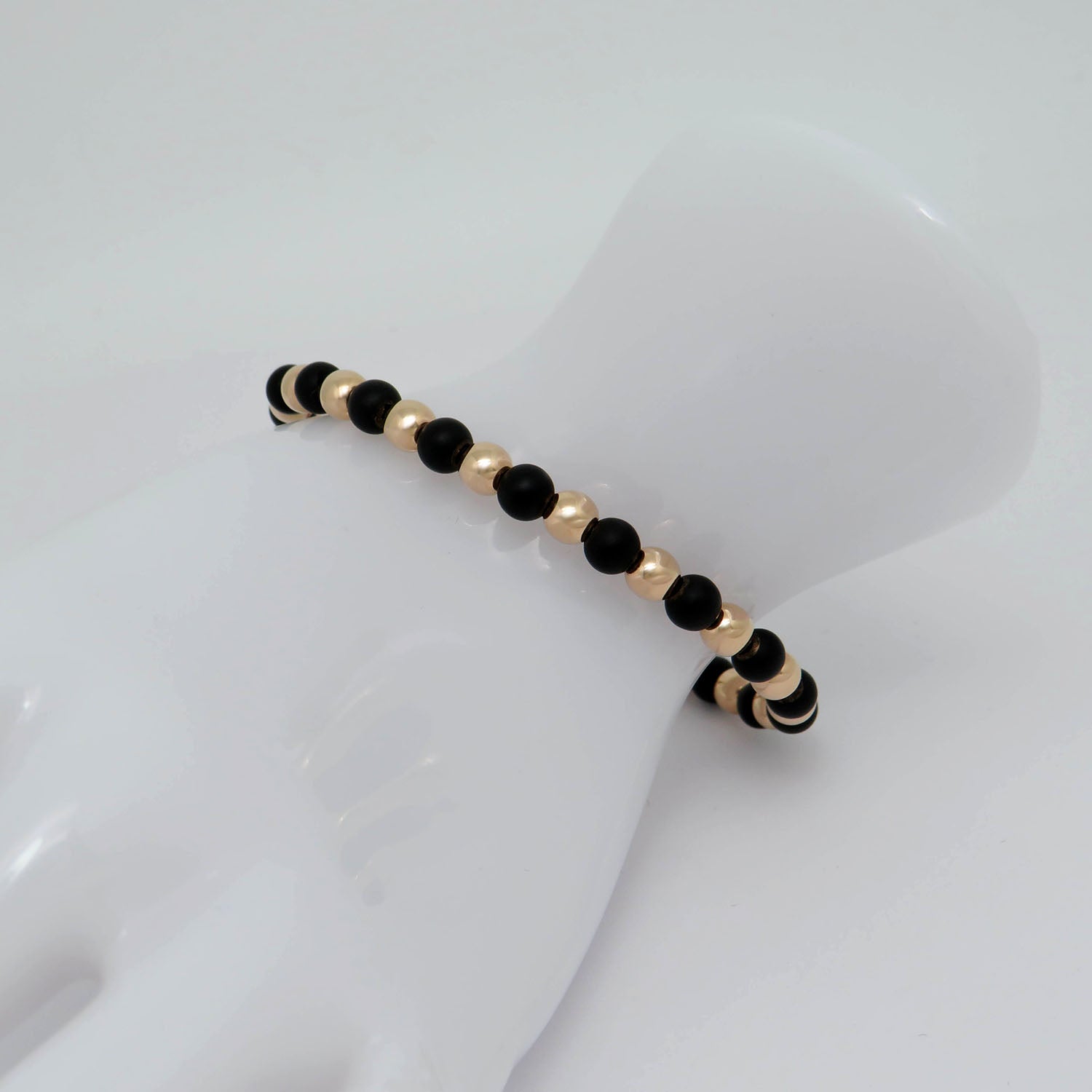 Jaibor bangle with onyx trimming in 750/18K rose gold / Titanium