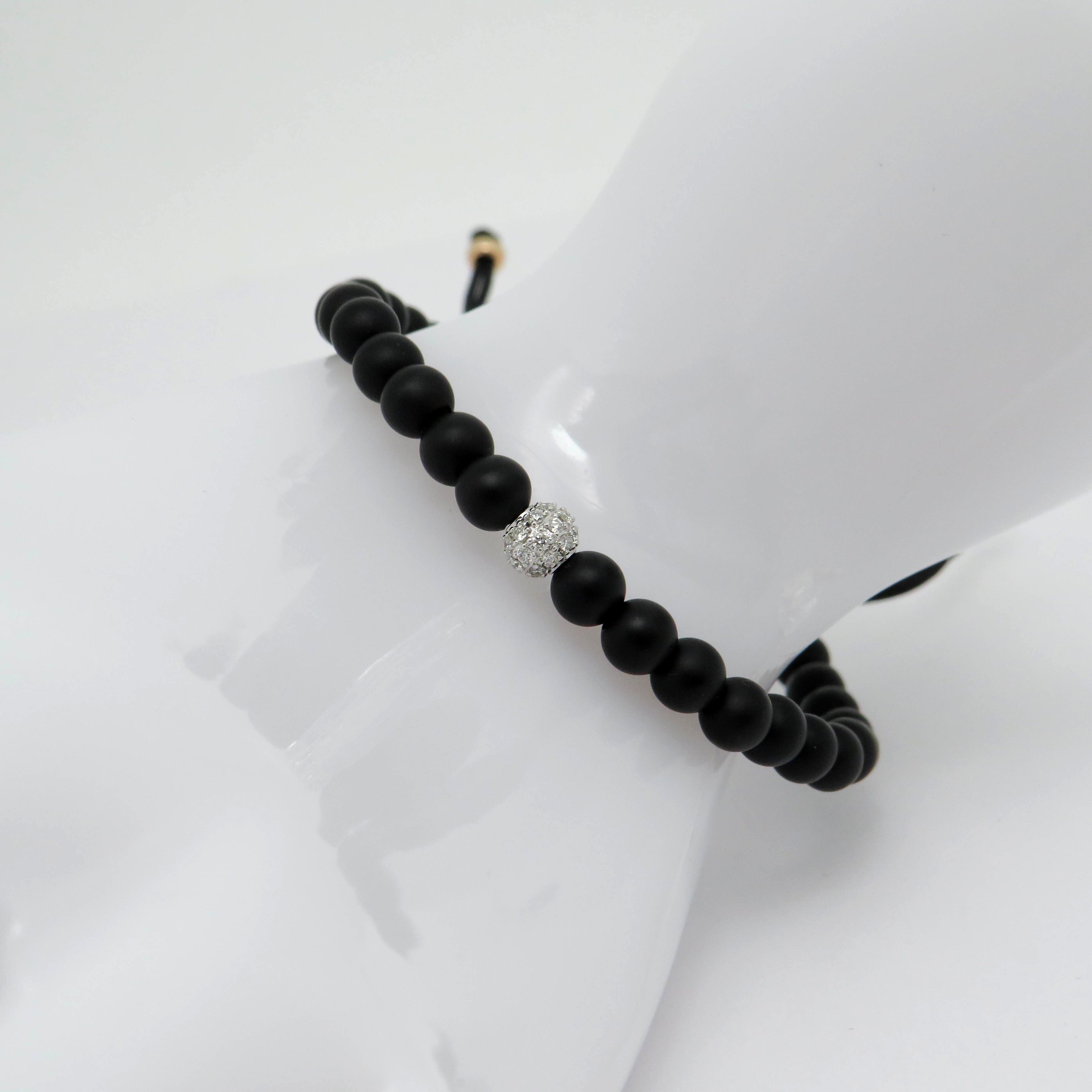 Jaibor pull bracelet with 0.24ct G-si brilliant-cut diamond and onyx in 750/18K rose gold / nylon