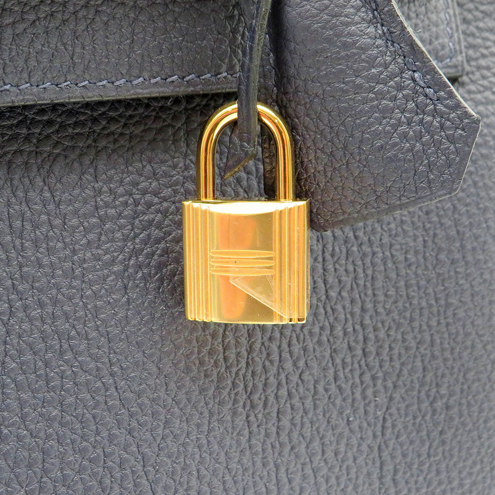 Hermès Kelly 32 Retourne Veau Togo 2Z bleu Nuit mit Gelbgold Beschlägen